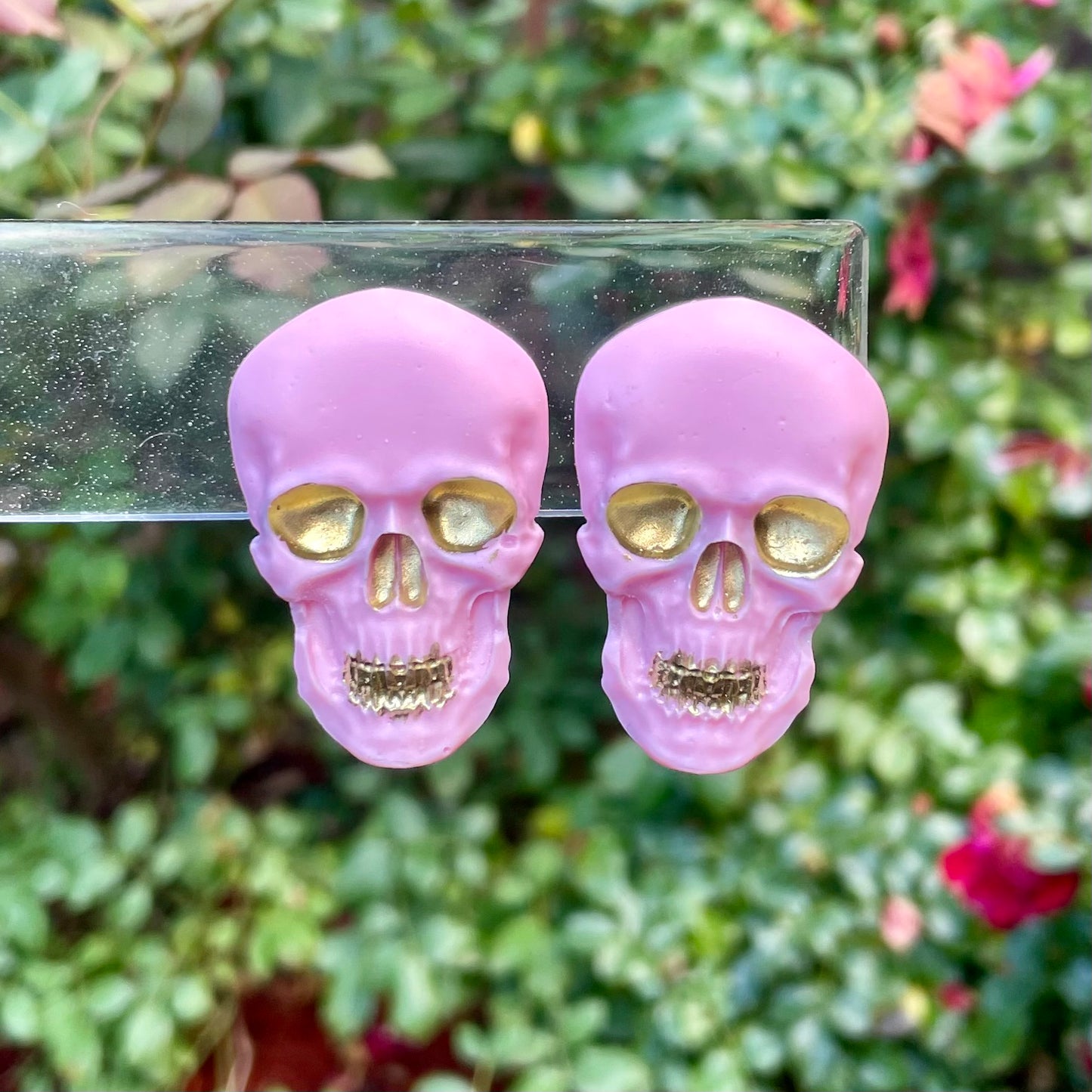 pink & gold skull earrings